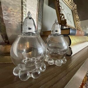Mid century ball footed,clear glass, salt and pepper shaker.